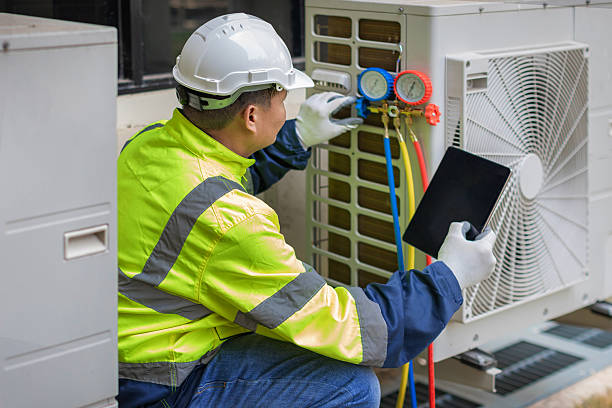 Professional Hvac Installation technician working in Russellville, AR